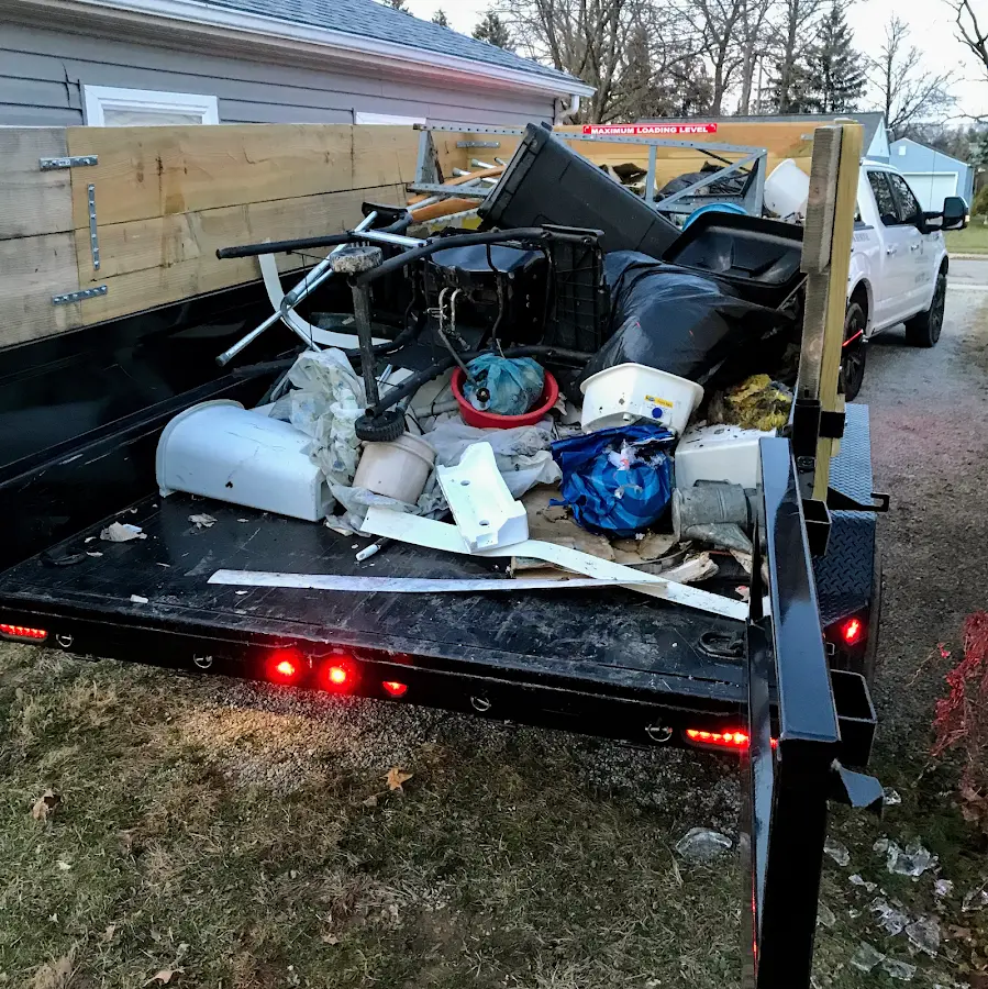 Roll-off dumpster delivered to a residential driveway in Cranston